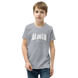 Preteen model wearing a Aloha Tribe Hawaii T-shirt that has a Hawaii themed graphic logo on the front.