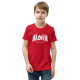 Preteen model wearing a Aloha Tribe Hawaii T-shirt that has a Hawaii themed graphic logo on the front.