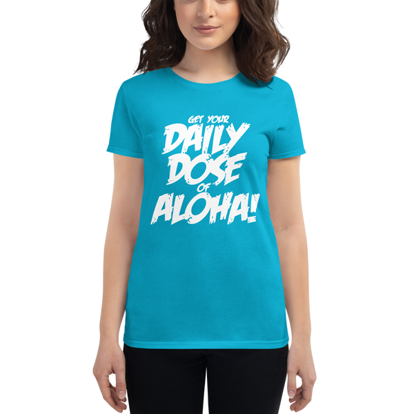 Young female wearing a Aloha Tribe Hawaii shirt that has a Hawaii themed graphic logo on the front.