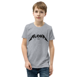 Preteen model wearing a Aloha Tribe Hawaii T-shirt that has a Hawaii themed graphic logo on the front.