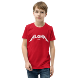 Preteen model wearing a Aloha Tribe Hawaii T-shirt that has a Hawaii themed graphic logo on the front.