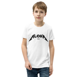 Preteen model wearing a Aloha Tribe Hawaii T-shirt that has a Hawaii themed graphic logo on the front.