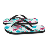 A pair of Alter Ego Hawaii flip flops which are also called slippers with a cool Hawaii themed graphic print.