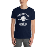 Young male adult wearing a Alter Ego Hawaii T-shirt that has a Hawaii themed graphic logo on the front.