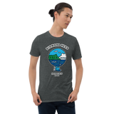 Young male adult wearing a Alter Ego Hawaii T-shirt that has a Hawaii themed graphic logo on the front.