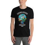Young male adult wearing a Alter Ego Hawaii T-shirt that has a Hawaii themed graphic logo on the front.