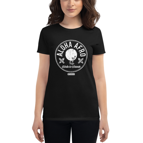 Young female wearing a Alter Ego Hawaii shirt that has a Hawaii themed graphic logo on the front.