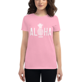 Young female wearing a Alter Ego Hawaii shirt that has a Hawaii themed graphic logo on the front.