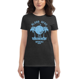 Young female wearing a Alter Ego Hawaii shirt that has a Hawaii themed graphic logo on the front.