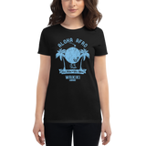 Young female wearing a Alter Ego Hawaii shirt that has a Hawaii themed graphic logo on the front.