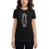 Young female wearing a Alter Ego Hawaii shirt that has a Hawaii themed graphic logo on the front.