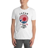 Young male adult wearing a Alter Ego Hawaii T-shirt that has a Hawaii themed graphic logo on the front.