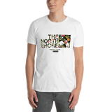 Young male adult wearing a Alter Ego Hawaii T-shirt that has a Hawaii themed graphic logo on the front.