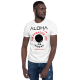 Young male adult wearing a Alter Ego Hawaii T-shirt that has a Hawaii themed graphic logo on the front.