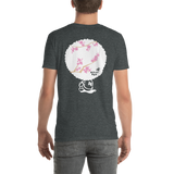 Young male adult wearing a Alter Ego Hawaii T-shirt that has a Hawaii themed graphic logo on the front.