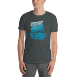 Young male adult wearing a Alter Ego Hawaii T-shirt that has a Hawaii themed graphic logo on the front.