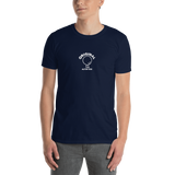 Young male adult wearing a Alter Ego Hawaii T-shirt that has a Hawaii themed graphic logo on the front.