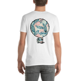 Young male adult wearing a Alter Ego Hawaii T-shirt that has a Hawaii themed graphic logo on the front.