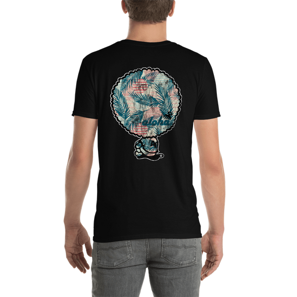 Young male adult wearing a Alter Ego Hawaii T-shirt that has a Hawaii themed graphic logo on the front.