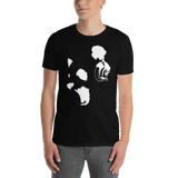 Young male wearing a Rhythm Arts Hawaii T-shirt that has a urban street themed graphic logo on the front.