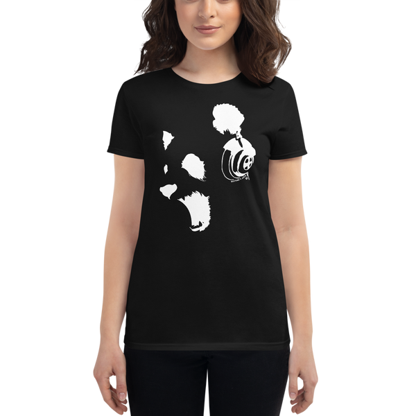 Young female wearing a Rhythm Arts shirt that has a Hawaii themed graphic logo on the front.