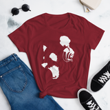 Young female wearing a Rhythm Arts shirt that has a Hawaii themed graphic logo on the front.