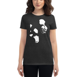 Young female wearing a Rhythm Arts shirt that has a Hawaii themed graphic logo on the front.