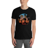 Young male wearing a Rhythm Arts Hawaii T-shirt that has a urban street themed graphic logo on the front.