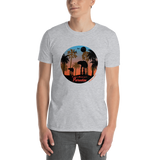 Young male wearing a Rhythm Arts Hawaii T-shirt that has a urban street themed graphic logo on the front.