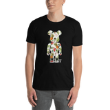 Young male wearing a Rhythm Arts Hawaii T-shirt that has a urban street themed graphic logo on the front.