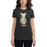 Young female wearing a Rhythm Arts shirt that has a Hawaii themed graphic logo on the front.