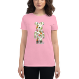 Young female wearing a Rhythm Arts shirt that has a Hawaii themed graphic logo on the front.