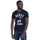 Young male wearing a Rhythm Arts Hawaii T-shirt that has a urban street themed graphic logo on the front.