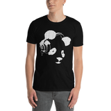 Young male wearing a Rhythm Arts Hawaii T-shirt that has a urban street themed graphic logo on the front.