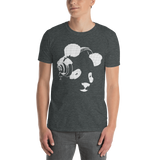 Young male wearing a Rhythm Arts Hawaii T-shirt that has a urban street themed graphic logo on the front.