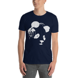 Young male wearing a Rhythm Arts Hawaii T-shirt that has a urban street themed graphic logo on the front.