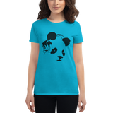 Young female wearing a Rhythm Arts shirt that has a Hawaii themed graphic logo on the front.