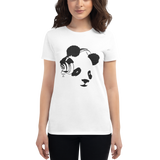 Young female wearing a Rhythm Arts shirt that has a Hawaii themed graphic logo on the front.