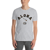 Young male wearing a Rhythm Arts Hawaii T-shirt that has a urban street themed graphic logo on the front.