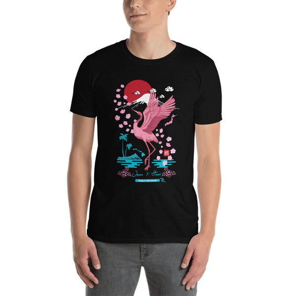 Young male wearing a Rogue Labs Hawaii T-shirt that has a Japanese Hawaii urban street themed graphic logo on the front.