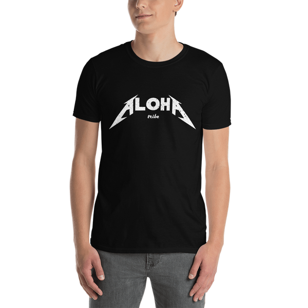 A male model wearing a Aloha Tribe Hawaii T-shirt that has Hawaii themed graphic logos on the front.