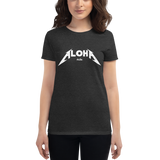Young female wearing a Aloha Tribe Hawaii shirt that has a Hawaii themed graphic logo on the front.