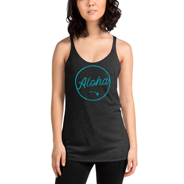 Young female wearing a Aloha Tribe Hawaii racerback tank top that has Hawaii themed graphic logos on the front.