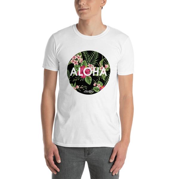 A male model wearing a Aloha Tribe Hawaii T-shirt that has Hawaii themed graphic logos on the front.