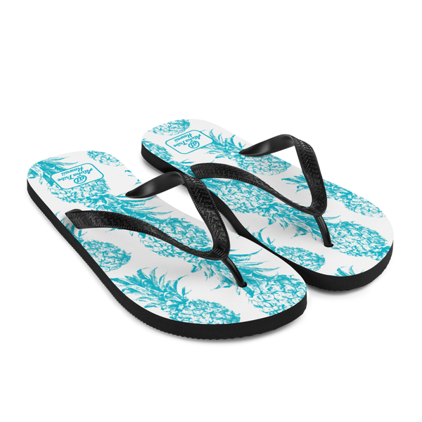 A pair of Aloha Tribe Hawaii flip flops which are also called slippers with a cool Hawaii themed graphic print.