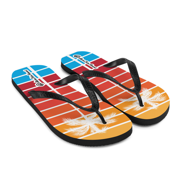 A pair of Aloha Tribe Hawaii flip flops which are also called slippers with a cool Hawaii themed graphic print.