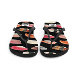 A pair of Aloha Tribe Hawaii flip flops which are also called slippers with a cool Hawaii themed graphic print.