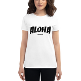 Young female wearing a Aloha Tribe Hawaii shirt that has a Hawaii themed graphic logo on the front.