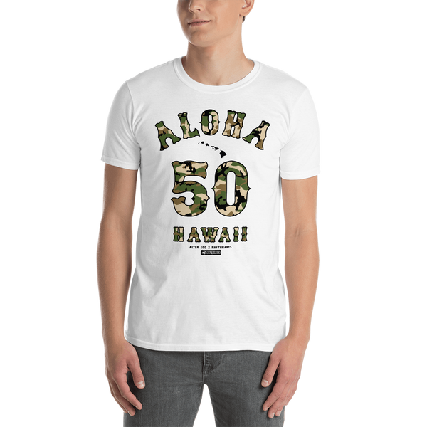 Young male adult wearing a Alter Ego Hawaii T-shirt that has a Hawaii themed graphic logo on the front.