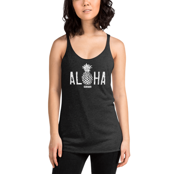 Young female adult wearing a Alter Ego Hawaii racerback tank top that has a Hawaii themed graphic logo on the front.